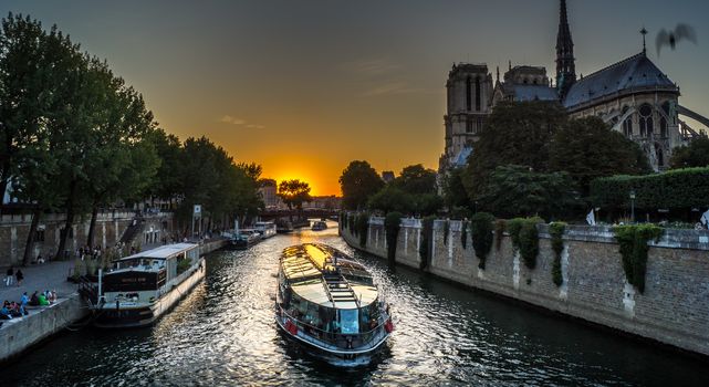 Peniche boat in Paris at sunset on the Seine river