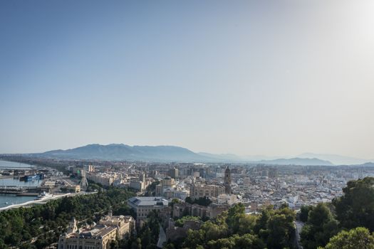 Cityscape aerial view of Malaga, Spain. The Cathedral of Malaga is a Renaissance church in the city of Malaga in Andalusia in southern Spain during sunset