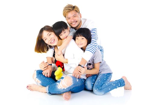 Indoor portrait of a happy asian family