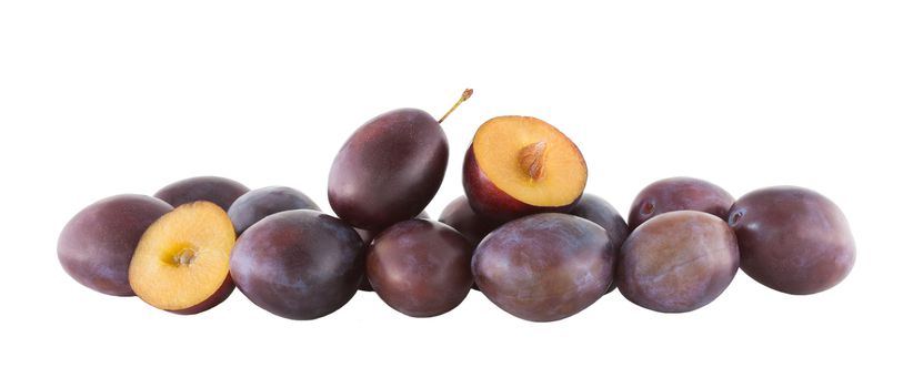 Fruits, plums isolated on white background in a row