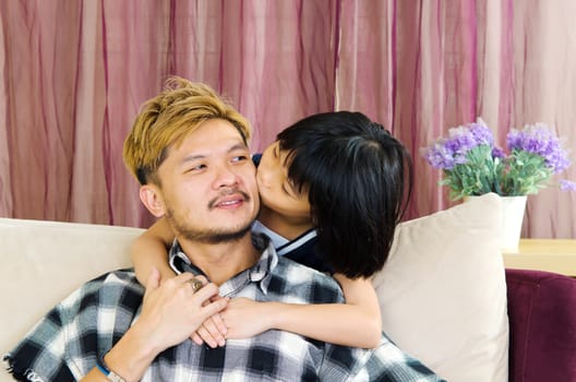 happy asian family in the living room