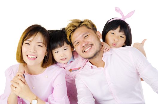 Indoor portrait of a happy asian family