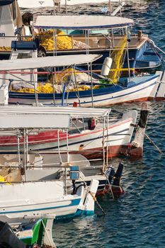 fishing boat in the blue sea of a greek island