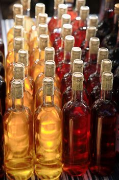 close up of bottles with wine  