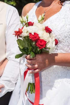 closeup of a bride's wedding bouquet of roses