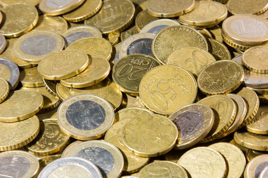 heap of euros coins isolated on a white background