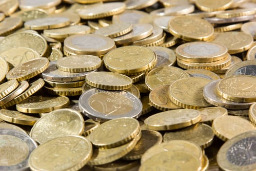 heap of euros coins isolated on a white background