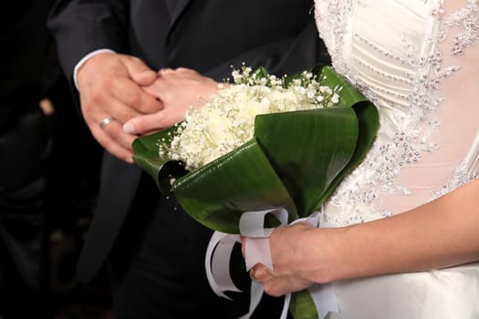 bride holds wedding bouquet