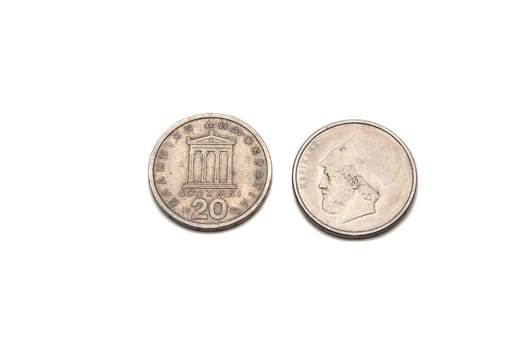 greek drachma coins isolated on a white background