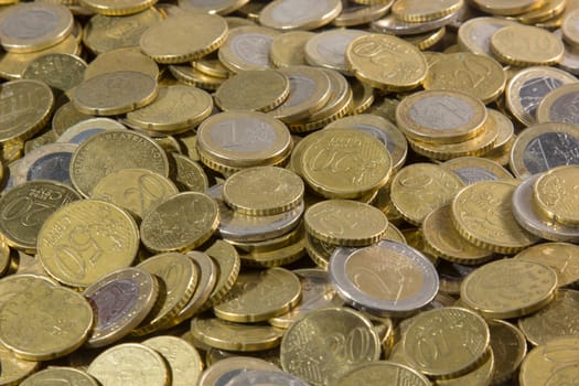 heap of euros coins isolated on a white background