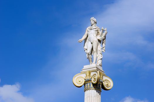 beautiful ancient greek statue from marble on a column in Athens 