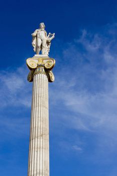 beautiful ancient greek statue from marble on a column in Athens 