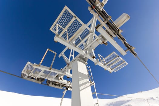 ski lift on the slope of a big ski resort