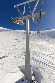 ski lift on the slope of a big ski resort