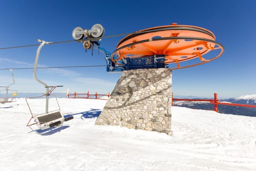 ski lift on the slope of a big ski resort