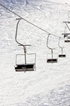 ski lift on the slope of a big ski resort