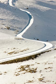 beautiful road on the mountain full of snow 