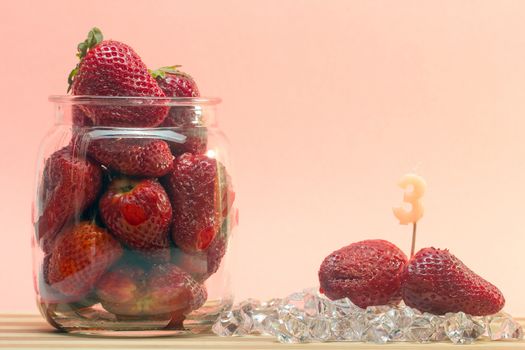 fresh strawberries with birthday candles sticks