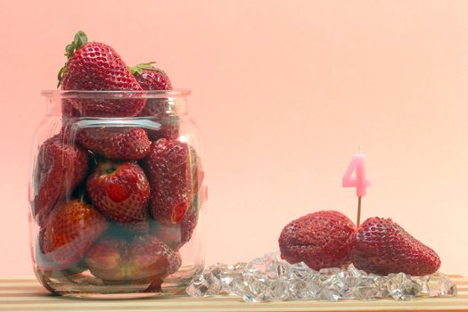 fresh strawberries with birthday candles sticks