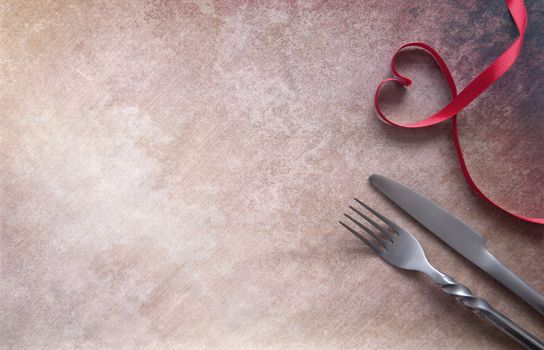 Heart shape satin ribbon with fork and knife and space for text 