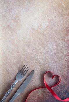 Heart shape satin ribbon with fork and knife 