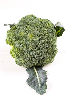 Fresh broccoli on white wooden table background