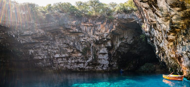 tourists from europe enjoy the atmosphere of this unique cave called melissani in the island of kefalonia, August 1st 2015, Greece