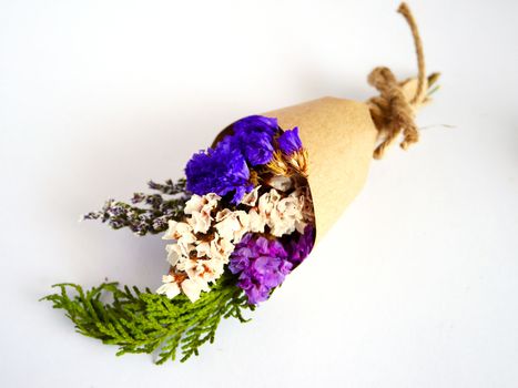 Beautiful dry flower on white background