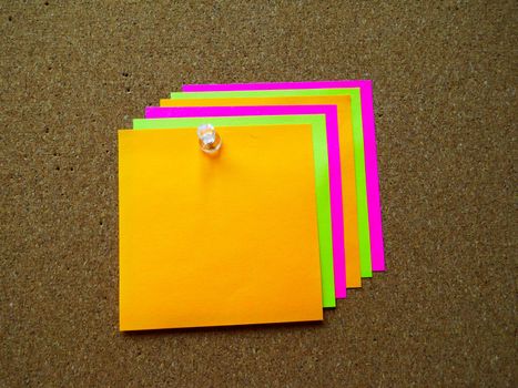 Colorful post it note on wood board