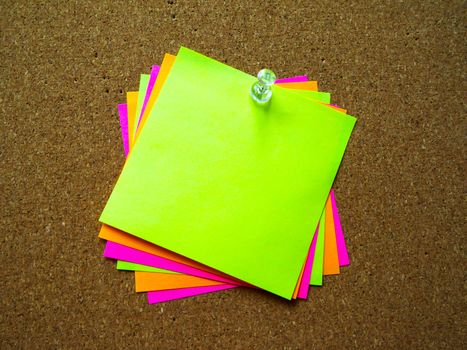 Colorful post it note on wood board