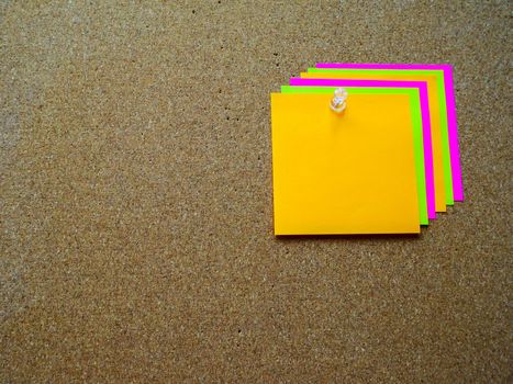 Colorful post it note on wood board with copy space