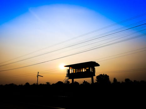 Vintage old silhouette railway station with blue sky in thailand