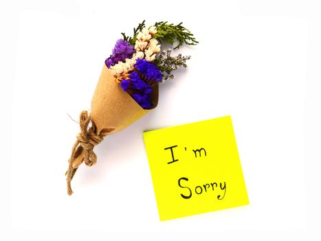 I'm sorry post note and dry bouquet on white background