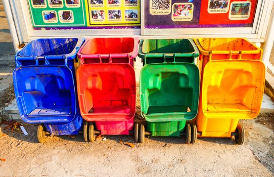 Old colorful bin on street