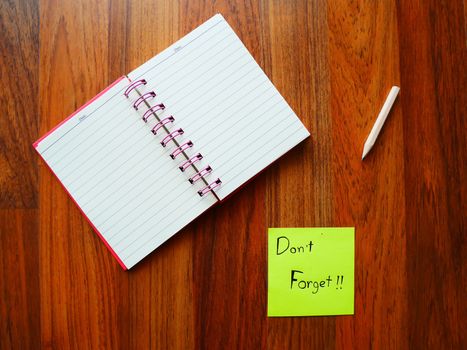 Don't forget post it with note book on top view