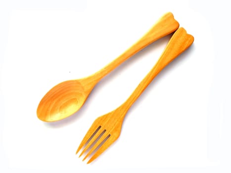 Wooden spoon and fork on white backgound