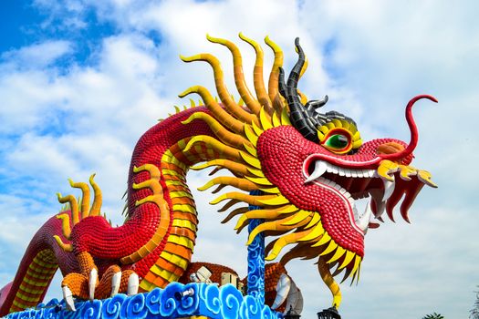 Beautiful red dragon with blue sky