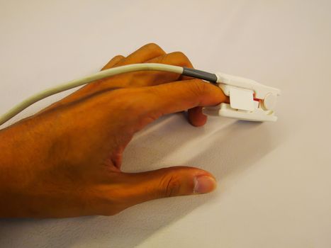 Pulse oximeter probe on hand