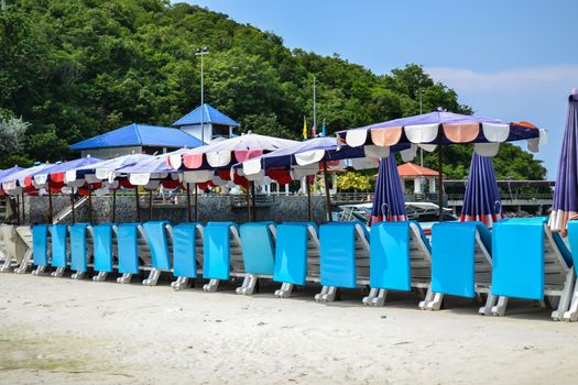 Beautiful blue beach chair prepare for tourism in thailand