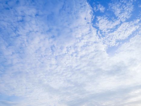 Many clouds on blue sky background