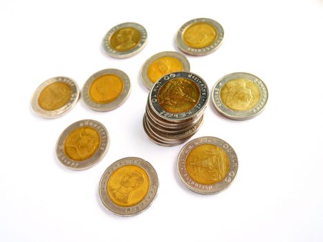 10 baht thai coin isolated on white background with selective focus