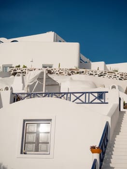 Small traditional white houses in Santorini island, Greece