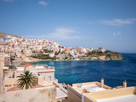 View of Syros town with beautiful buildings and houses in a sunny day