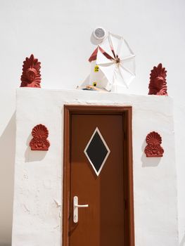 Exterior traditional decoration of a house in Syros island, Greece