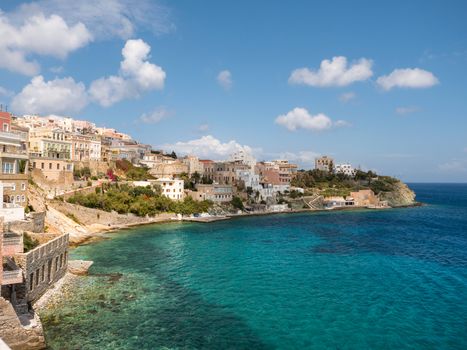 View of Syros town with beautiful buildings and houses  in a sunny day