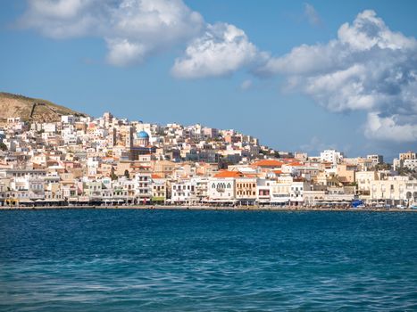 SYROS, GREECE - APRIL 10, 2016:View of Syros town with beautiful buildings and houses in a sunny day
