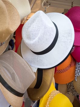 Colorful hats hanged outside a touristic shop