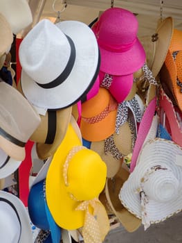 Colorful hats hanged outside a touristic shop
