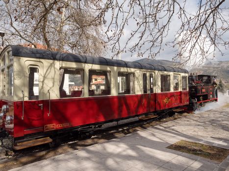 Kalavrita, Greece - February 18, 2017: Old vintage steam powered train at the train station of Kalavrita Greece, 