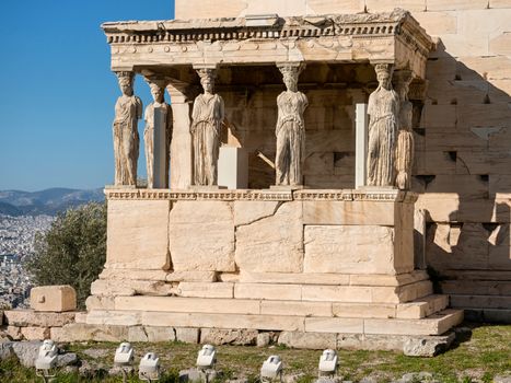 The Erechtheum with caryatids near Parthenon temple in Acropolis hill